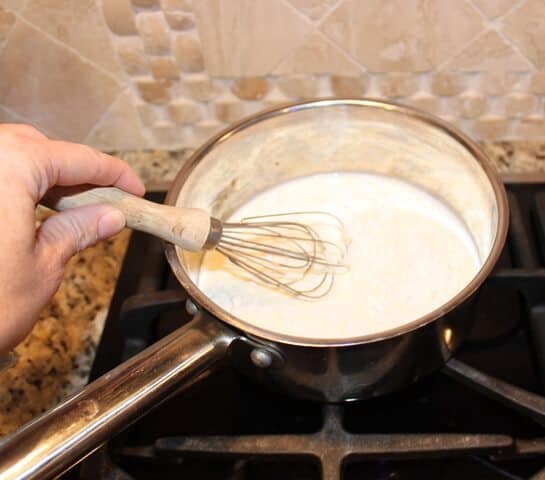 Blend a bit of the milk and flour to make a smooth mixture.