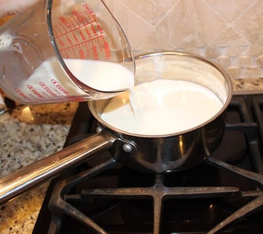 Slowly pour in the milk.