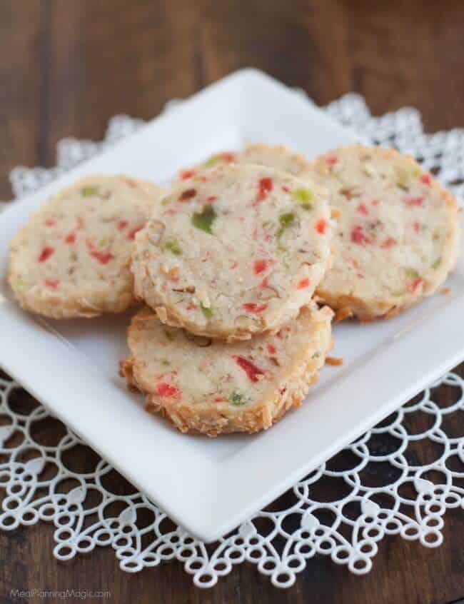 Santa's Whiskers Cookies are a shortbread cookie with candied fruit, nuts and coconut to make a fun and festive way to celebrate the holidays! Easy to make ahead too.