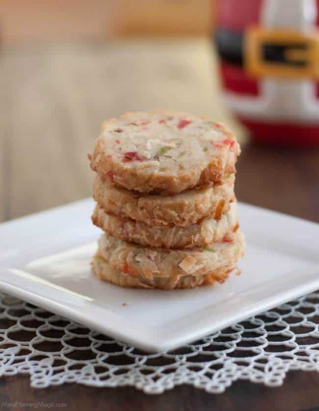 Santa's Whiskers Cookies are a shortbread cookie with candied fruit, nuts and coconut to make a fun and festive way to celebrate the holidays! Easy to make ahead too.