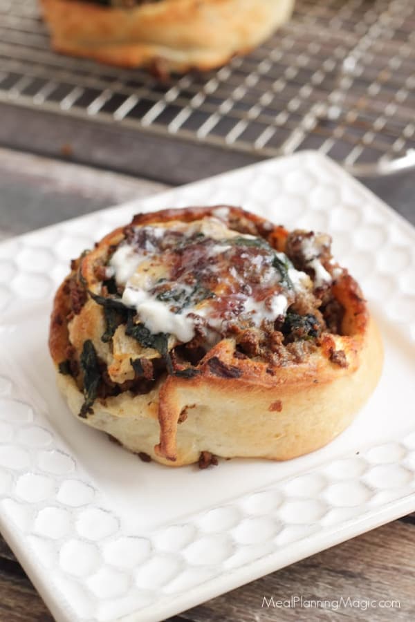 image of beef sticky bun on white plate