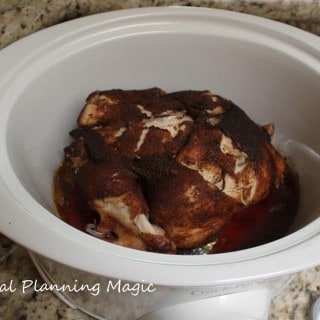Slowcooker Rotisserie Chicken is so easy and delicious, you'll never want to make it any other way! Recipe at mealplanningamagic.com #rotisserie #chicken #slowcooker