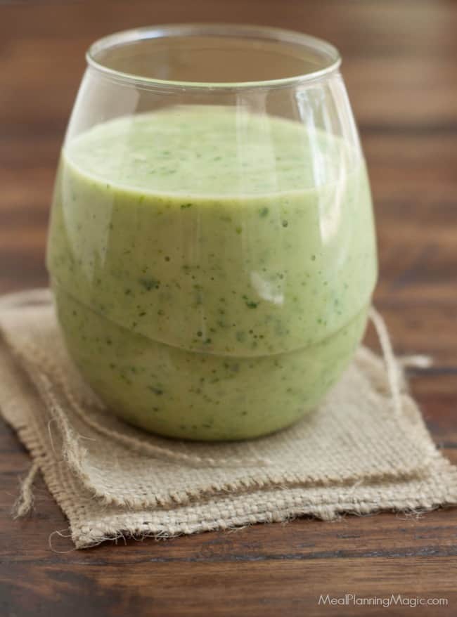 Filled with nutritious fruits and vegetables, we call it a Green Monster Smoothie because it it has all kinds of healthy goodness and it tastes delicious! | Recipe at MealPlanningMagic.com