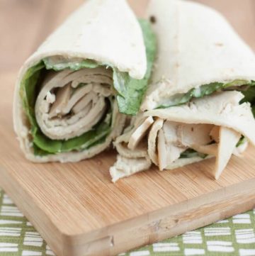 This Chicken Caesar salad wrap is a delicious sandwich wrap combining chicken lunch meat with a fresh Caesar salad! Perfect make ahead meal for lunch boxes!