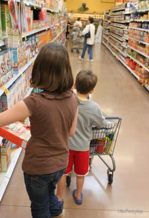 Kid-sized shopping carts at one of our local stores makes it fun to have kids help you shop