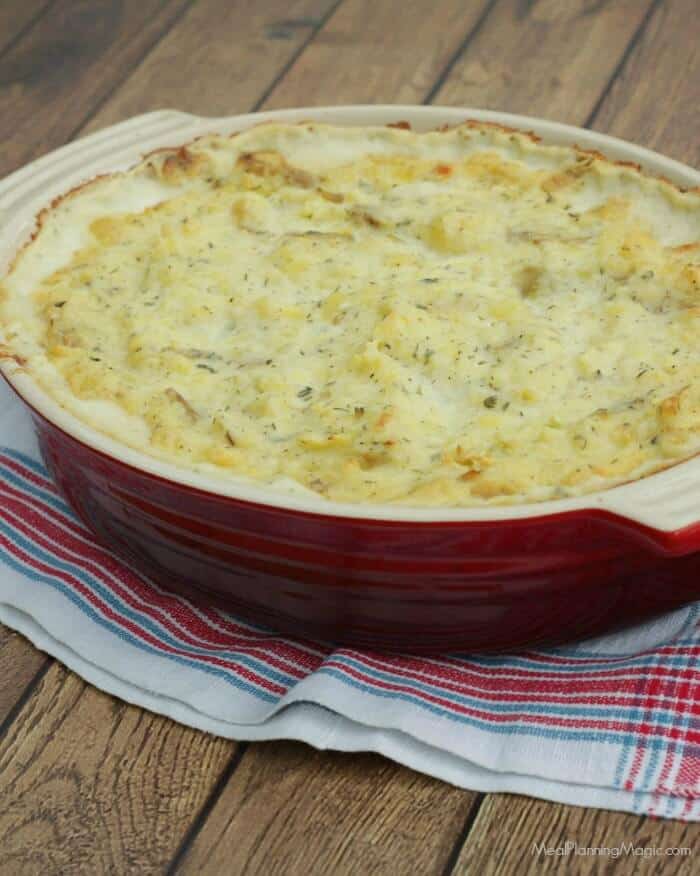 Make ahead and freezer friendly? You won't believe how easy this Garlic Herb Mashed Potatoes Casserole is to make and have on hand for any occasion! | Get the recipe at MealPlanningMagic.com