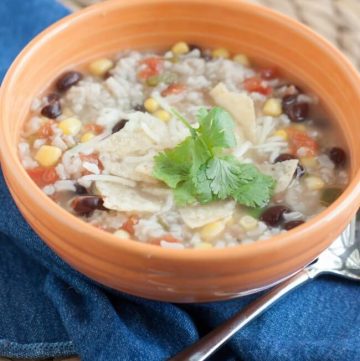 My Chicken Rice and Black Bean Tortilla Soup is a family favorite that is full of flavor and easy enough you can have it on the table in about 30 minutes! | Recipe at MealPlanningMagic.com