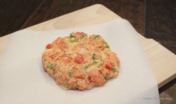 Uncooked jalapeno fresh salmon burgers