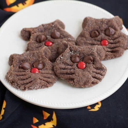 These Super Simple Chocolate Black Cat Face Cookies are fun for kids to make and perfect for your Halloween celebrations. Get the recipe at MealPlanningMagic. com