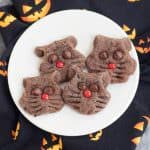 This easy Halloween cookies recipe for Chocolate Black Cat Cookies is fun for kids to help with and a fun way to celebrate Halloween. Recipe at MealPlanningMagic. com