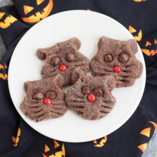 This easy Halloween cookies recipe for Chocolate Black Cat Cookies is fun for kids to help with and a fun way to celebrate Halloween. Recipe at MealPlanningMagic. com