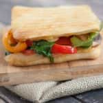Packed with bell peppers, onions, mushrooms and spinach, this Simple Sauteed Vegetable Panini can be made in under 15 minutes. Perfect for lunch or dinner! | Recipe at MealPlanningMagic.com