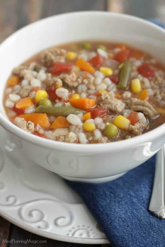 This Simple Slowcooker Turkey Vegetable Barley Soup is a cinch to throw together and better yet, it cooks all day in the slowcooker so dinner's ready at the end of a busy day! | Recipe at MealPlanningMagic.com