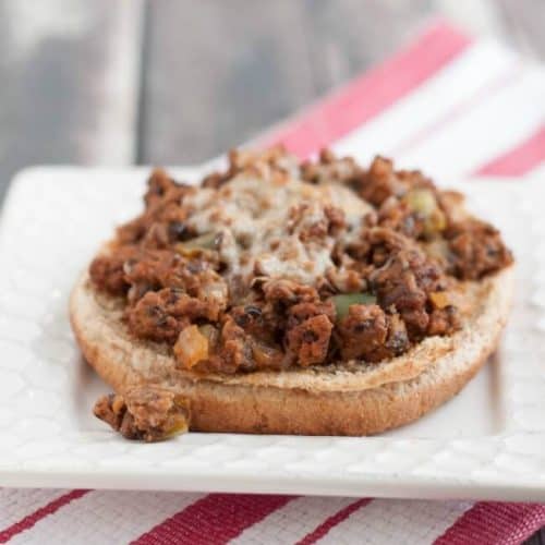 These open-faced pizza sloppy joes come together quickly and easily even on the busiest of nights! Make a double batch to keep some in the freezer for any time! Recipe at MealPlanningMagic.com