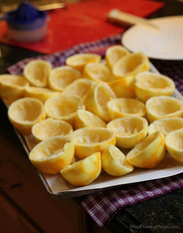 Freezing lemon peels for garbage disposal cleaner.