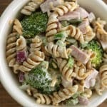 This make ahead Ham & Broccoli Pasta Salad is perfect for a luncheon or dinner when you don't want to turn on the oven! | Recipe at MealPlanningMagic.com