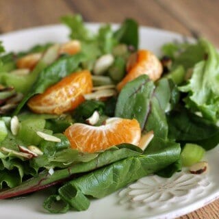 Enjoy the flavors of the season with this Mandarin Tossed Salad. You'll be amazed at how quickly you can throw together a delicious salad and try something new! | Find the recipe at MealPlanningMagic.com