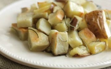 Roasted Rosemary Potatoes are SO easy and with my make-ahead tip, you can make them even on busy weeknights! Get the recipe at MealPlanningMagic.com