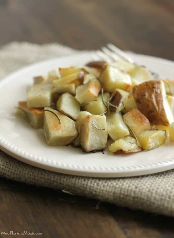 Roasted Rosemary Potatoes are SO easy and with my make-ahead tip, you can make them even on busy weeknights! Get the recipe at MealPlanningMagic.com