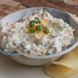 Loaded Baked Potato Dip-only four ingredients and oh, so delicious! It's one of our all-time favorite dips and perfect for any occasion! Get the recipe at MealPlanningMagic.com