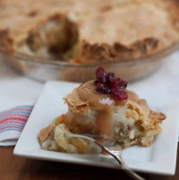 Thanksgiving Leftover Pie is comfort food at it's best! Combine your favorite traditional Thanksgiving leftovers like turkey with a creamy vegetable mixture, stuffing and mashed potatoes then add a pie crust to make this savory pie that is sure to be a huge hit and take reinventing leftovers to a new level. Get the recipe at MealPlanningMagic.com