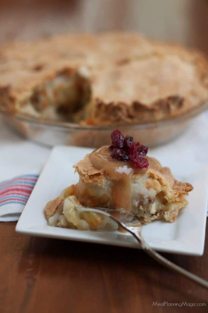 Thanksgiving Leftover Pie is comfort food at it's best! Combine your favorite traditional Thanksgiving leftovers like turkey with a creamy vegetable mixture, stuffing and mashed potatoes then add a pie crust to make this savory pie that is sure to be a huge hit and take reinventing leftovers to a new level. Get the recipe at MealPlanningMagic.com