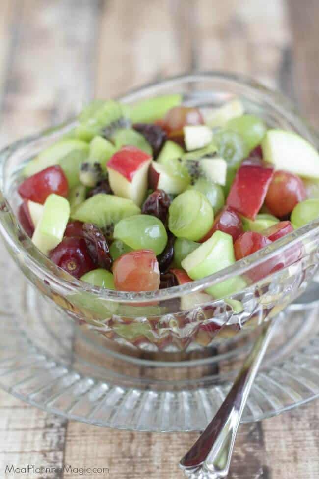 Who says the holidays can't be healthier? This festive Christmas Fruit Salad has very little added sugar (from honey) and is perfect for just about any occasion. | Get the recipe at MealPlanningMagic.com