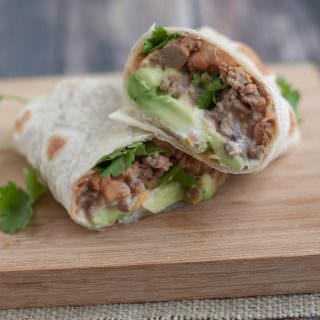With just a few ingredients, these Easy Beef and Bean Burritos are not only simple to whip up, they are also budget friendly. They are a family favorite! Recipe at MealPlanningMagic.com