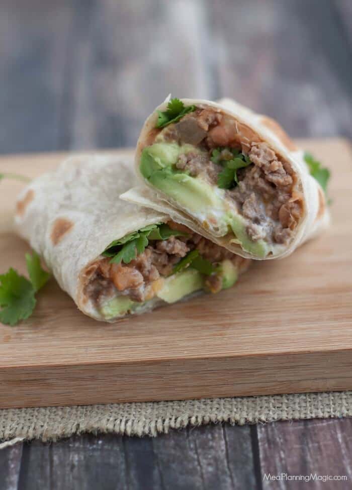 With just a few ingredients, these Easy Beef and Bean Burritos are not only simple to whip up, they are also budget friendly. They are a family favorite! Recipe at MealPlanningMagic.com