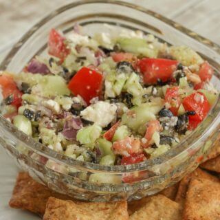 This veggie filled Mediterranean Salsa Dip is so fresh, delicious and super simple! Serve it with pita chips or as a side to grilled chicken or seafood. Find the recipe at MealPlanningMagic.com