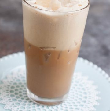 Cool off with a Homemade Iced Chai Latte and it's blend of subtly sweet and deliciously spices including cinnamon, ginger and cloves. My recipe is easy to make and can be made ahead!