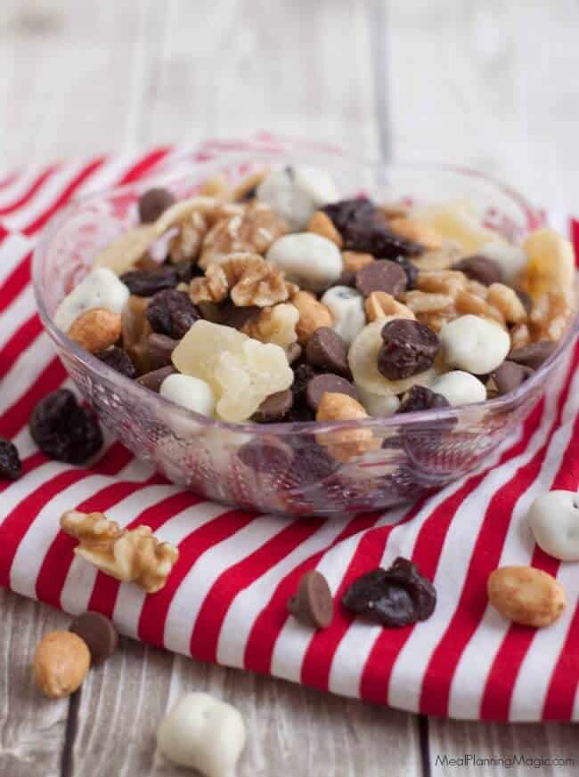 Banana Split Trail Mix is full of protein and nutrient rich nuts and dried fruit like banana chips, pineapple, cherries and just a touch of chocolate for a healthier treat on the go! 