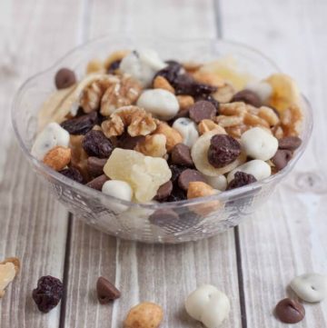 Banana Split Trail Mix is full of protein and nutrient rich nuts and dried fruit like banana chips, pineapple, cherries and just a touch of chocolate for a healthier treat on the go!