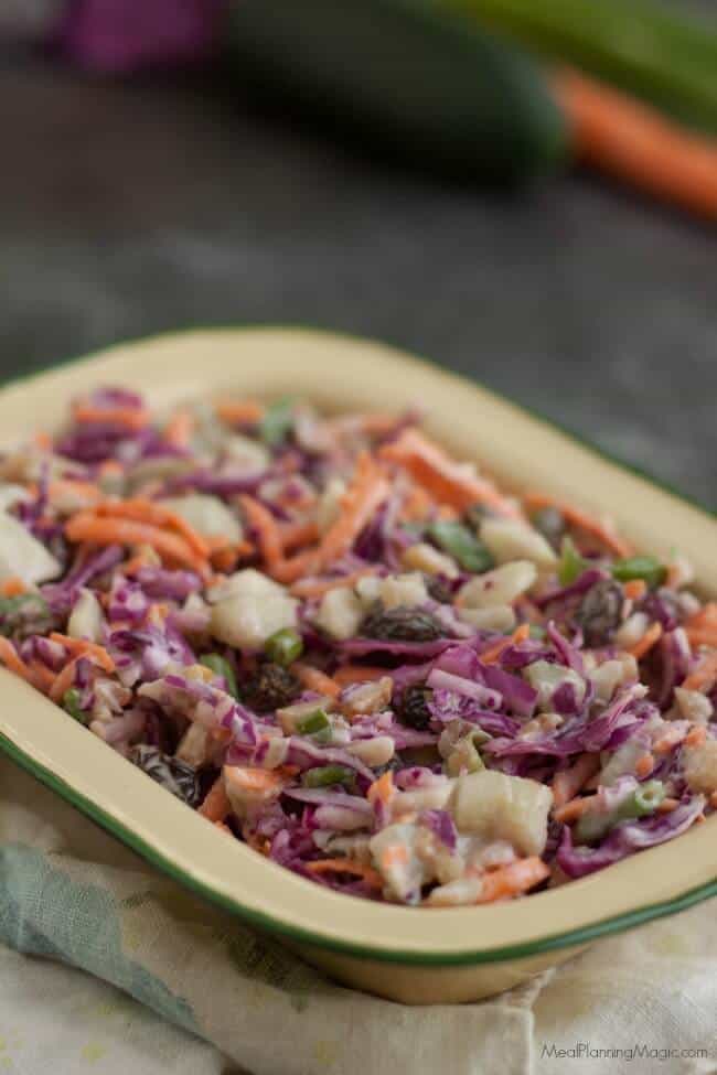 Filled with good for you vegetables, nuts and dried fruits, this Trailmix Coleslaw is easy to make ahead and do delicious too!