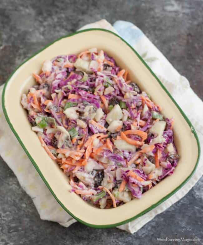 Filled with good for you vegetables, nuts and dried fruits, this Trailmix Coleslaw is easy to make ahead and do delicious too!