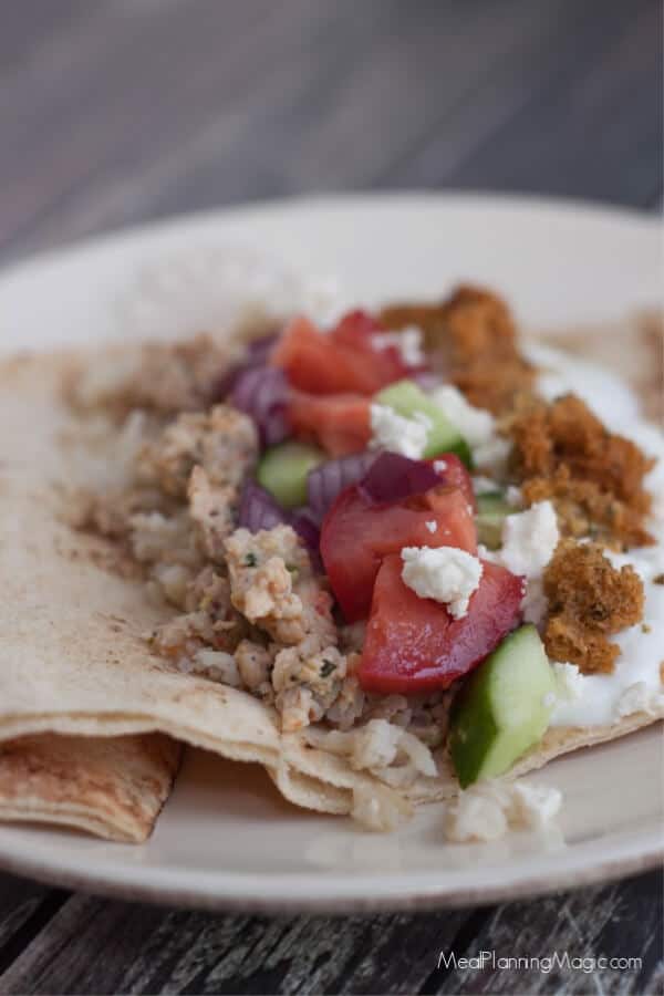 These Simple Greek Tacos are bursting with fresh vegetables, falafel and Greek seasoned ground beef, are a family favorite and really are so simple!