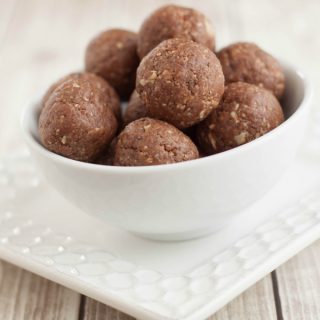 Image of Peanut Butter Chocolate Energy Bites in bowl on plate.