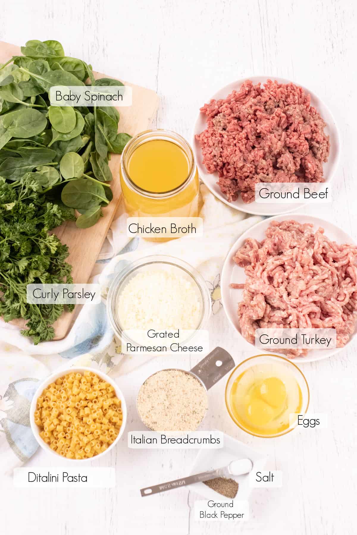 Labeled ingredients to make Crock Pot Italian Wedding Soup.