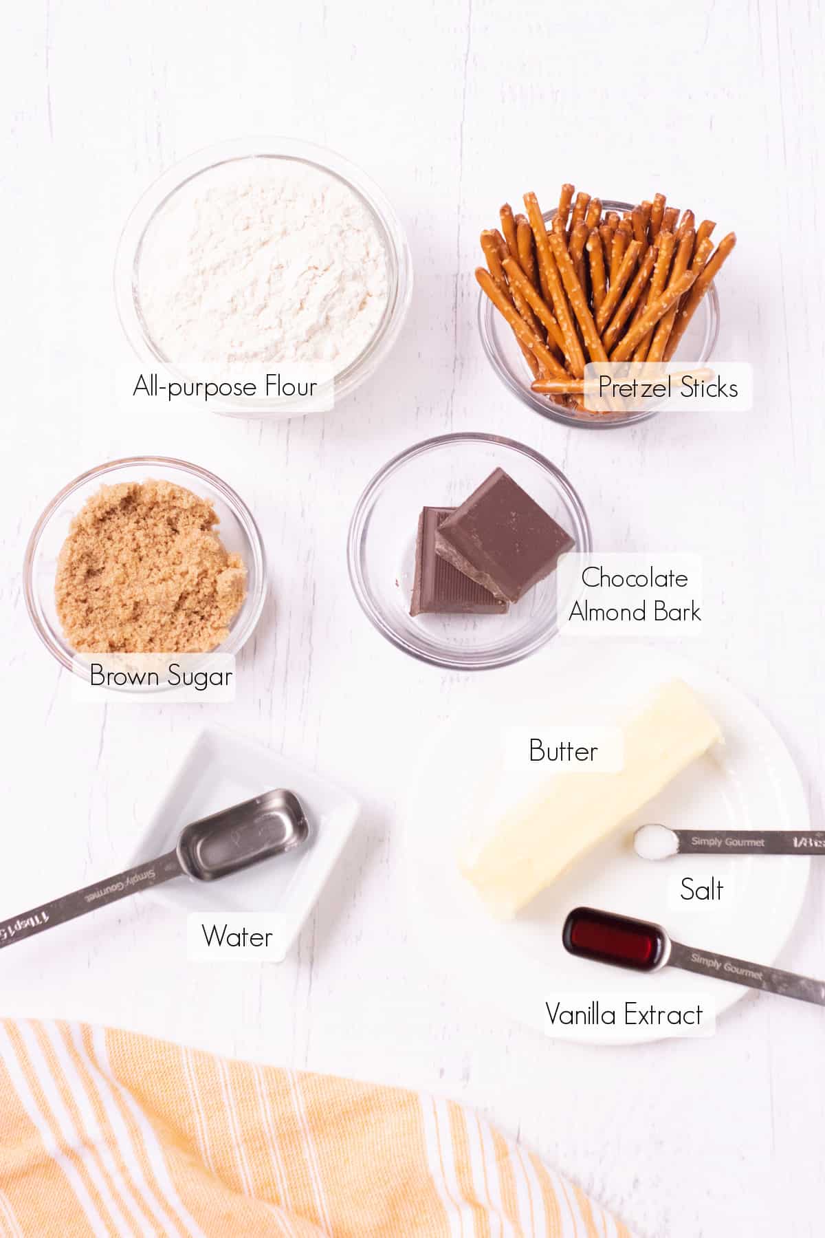 Labeled ingredients to make witches broom cookies. 