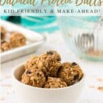 Peanut Butter Oatmeal Balls in white bowl and aqua linen in background with text overlay for pinterest.