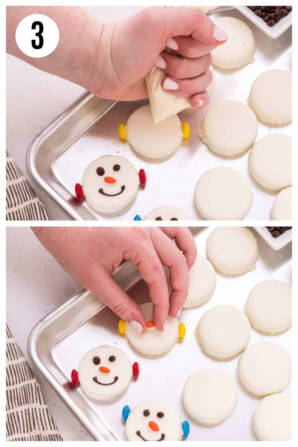 Hands showing bag of melted white chocolate being squeezed on center of white chocolate covered Oreo cookie and then orange chocolate covered sunflower seed being added for snowman face nose. 